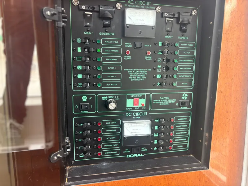 Slide: The Image of Control panel of a 2001 Doral 330 SE boat. - 14