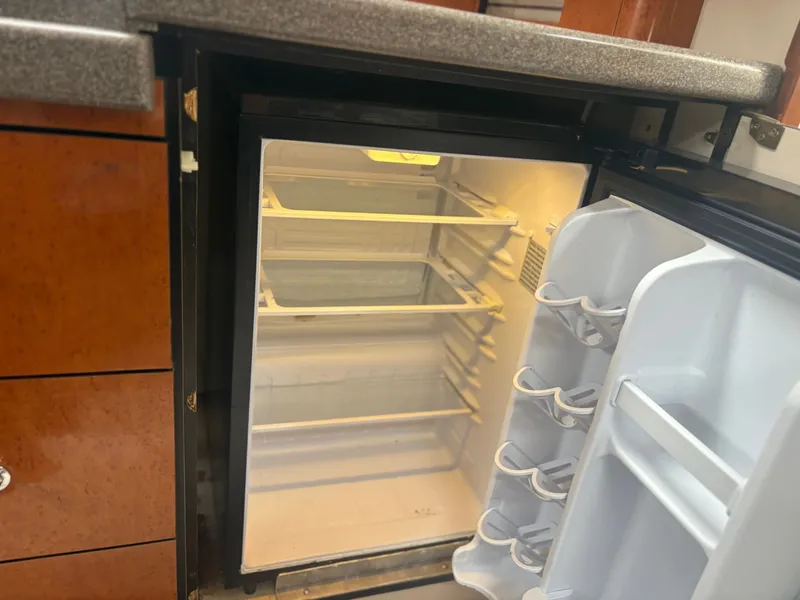 Slide: The Image of Open refrigerator in a 2001 Doral 330 SE yacht. - 20