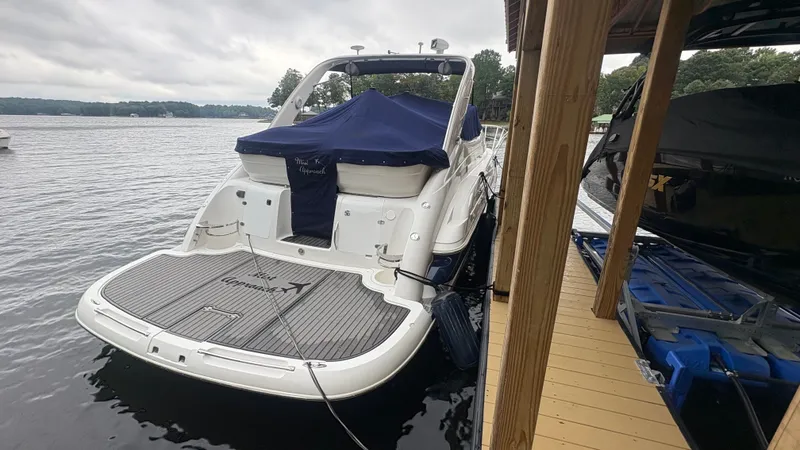 Slide: The Image of Interior of 2001 Doral 330 SE yacht with seating area and kitchenette. - 9