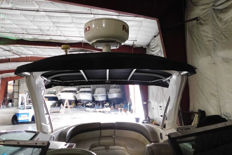 Slide: The Image of 2012 Sea Ray 300 SLX boat in storage facility with radar equipment. - 36