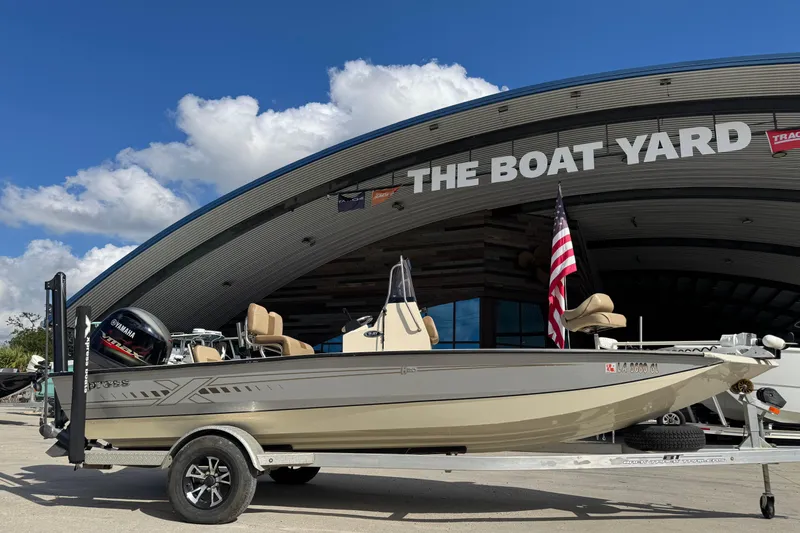 Slide: The Image of 2020 Xpress H20B Bay boat on trailer at The Boat Yard dealership. - 10