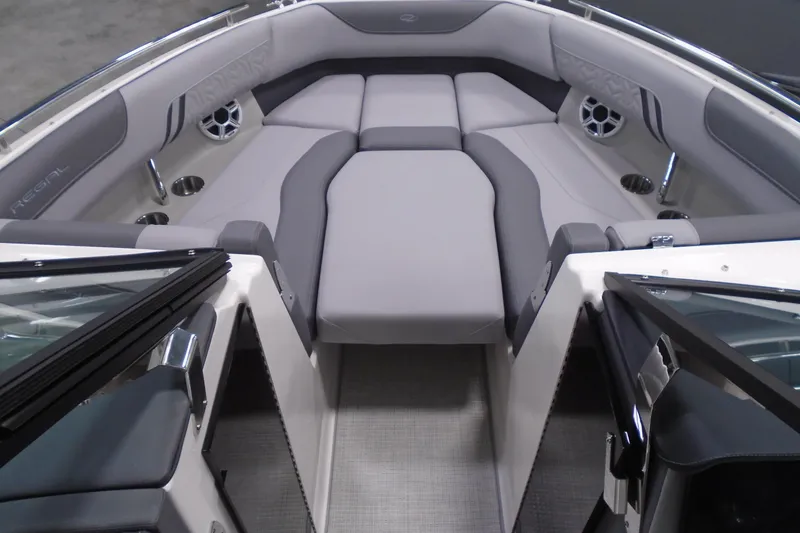 Slide: The Image of Luxurious interior of 2026 Regal LX4 boat with plush seating and modern design. - 18