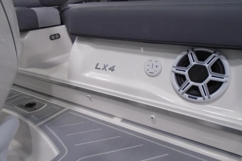 Slide: The Image of 2026 Regal LX4 boat interior with speaker and control panel. - 5