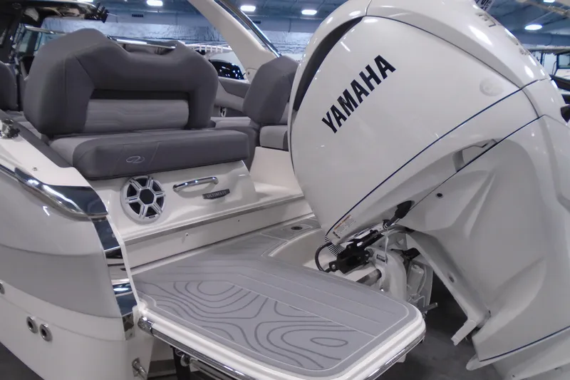 Slide: The Image of 2026 Regal LX4 boat with Yamaha outboard motor, featuring sleek seating and modern design. - 6