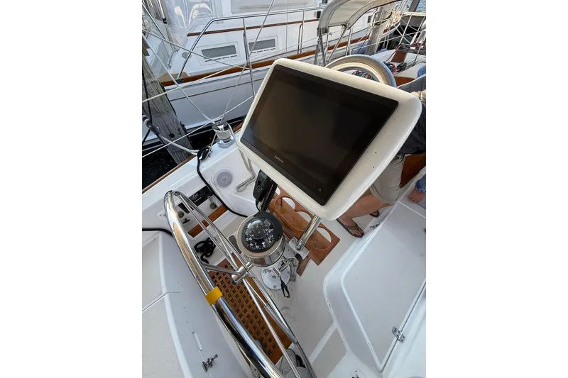 Slide: The Image of Cockpit of 1986 Tartan 37' sailboat with navigation equipment and compass. - 11