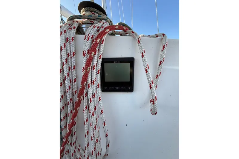 Slide: The Image of Ropes and Garmin device on 1986 Tartan 37' sailboat deck. - 14