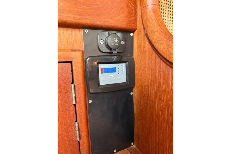 Slide: The Image of Control panel with USB port on 1986 Tartan 37' sailboat interior. - 21