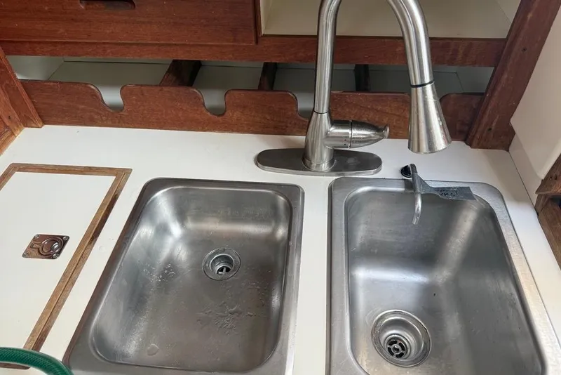Slide: The Image of Stainless steel double sink with modern faucet in 1986 Tartan 37' yacht kitchen. - 22