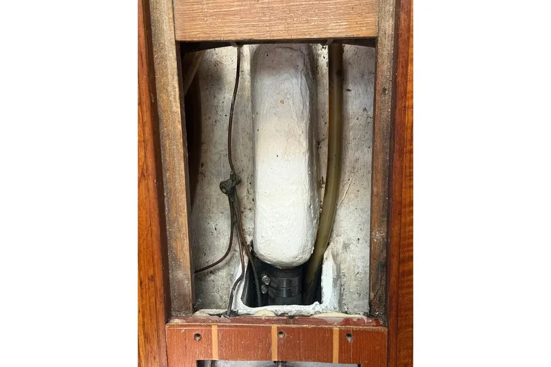 Slide: The Image of Interior view of a 1986 Tartan 37' sailboat, showing structural details and wiring. - 29