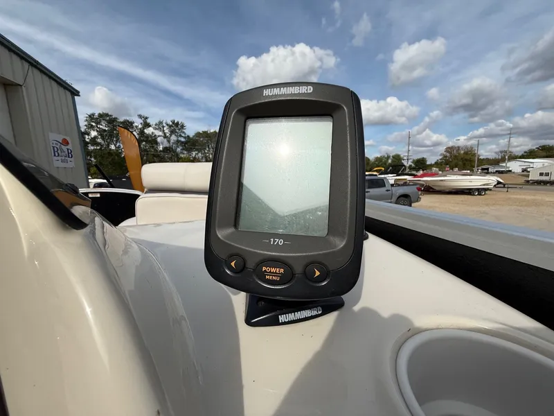 Slide: The Image of Fishfinder on 2012 Premier 180 SunSation boat, clear sky background. - 14
