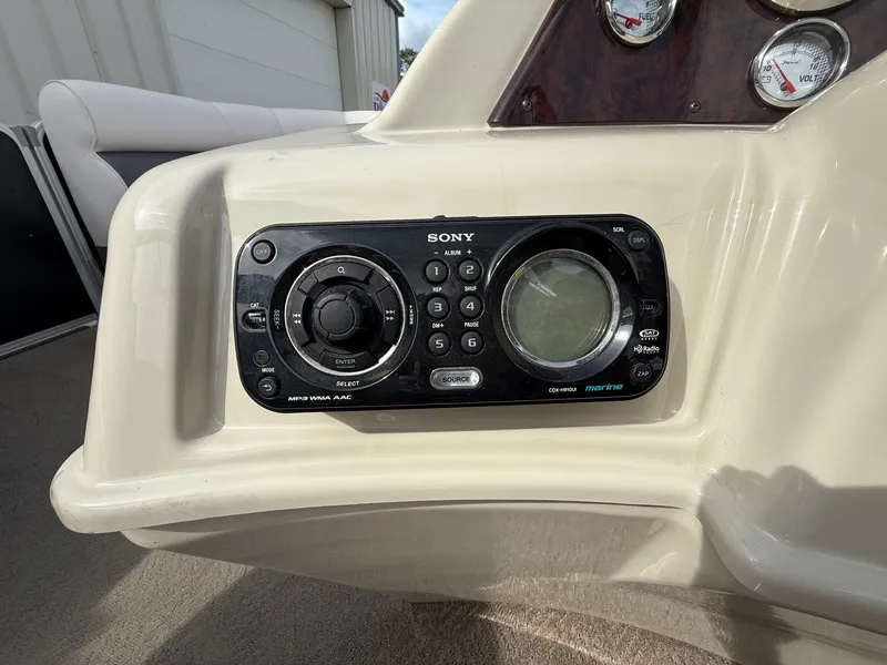 Slide: The Image of Sony marine stereo on 2012 Premier 180 SunSation boat dashboard. - 16