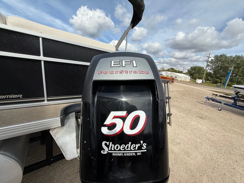 Slide: The Image of Outboard motor on 2012 Premier 180 SunSation boat, featuring EFI FourStroke engine. - 7