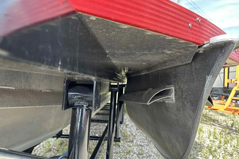 Slide: The Image of Underneath view of 2017 PlayCraft 2700 Extreme boat hull and support structure. - 15