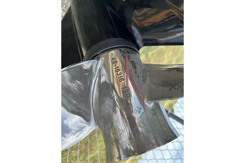 Slide: The Image of Close-up of a 2017 PlayCraft 2700 Extreme boat propeller with engraved numbers. - 32