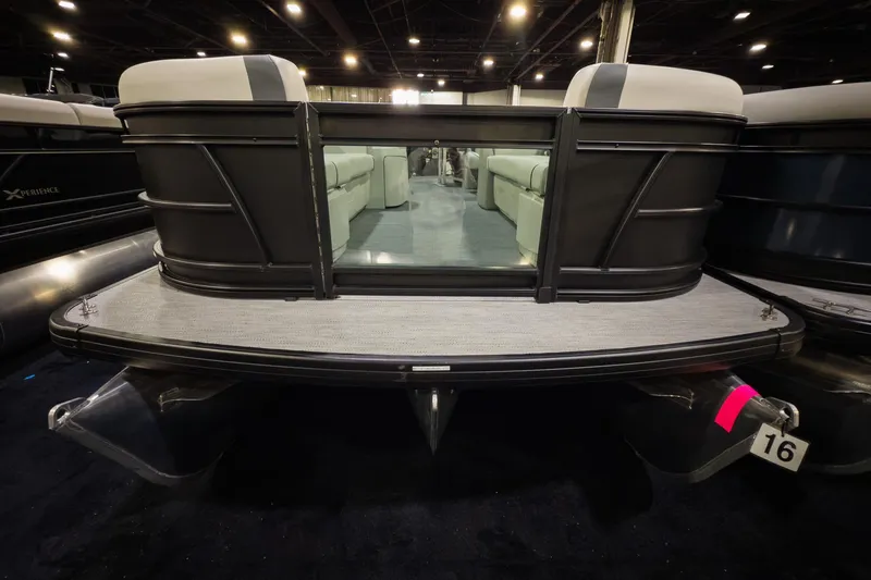 Slide: The Image of 2026 Godfrey Sweetwater 22' Split Bench Tritoon, rear view, showcasing spacious seating and modern design. - 2