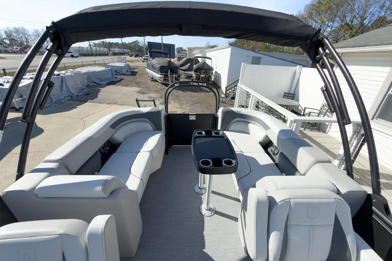 Slide: The Image of 2026 Godfrey Sweetwater 22' Split Bench Tritoon with spacious seating and modern design. - 45