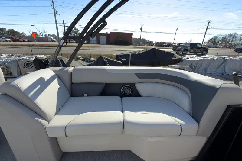 Slide: The Image of 2026 Godfrey Sweetwater 22' Tritoon interior with plush seating and modern design. - 46