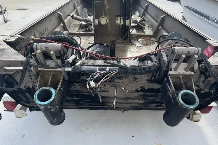 Slide: The Image of 2016 Pro-Drive X Series 20' boat interior, showing wiring and mechanical components. - 8