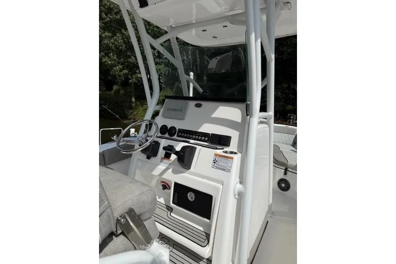 Slide: The Image of 2024 Sea Fox 228 Commander boat interior with spacious seating and elegant design. - 10