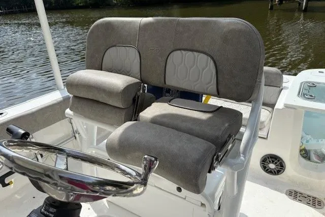 Slide: The Image of 2024 Sea Fox 228 Commander boat console with steering wheel and controls. - 16