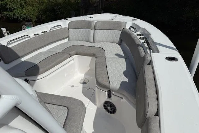 Slide: The Image of 2024 Sea Fox 228 Commander boat with spacious, cushioned seating in the bow area. - 25