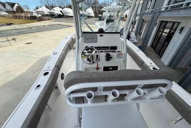 Slide: The Image of 2024 Sea Fox 228 Commander boat interior with steering console and rod holders. - 28