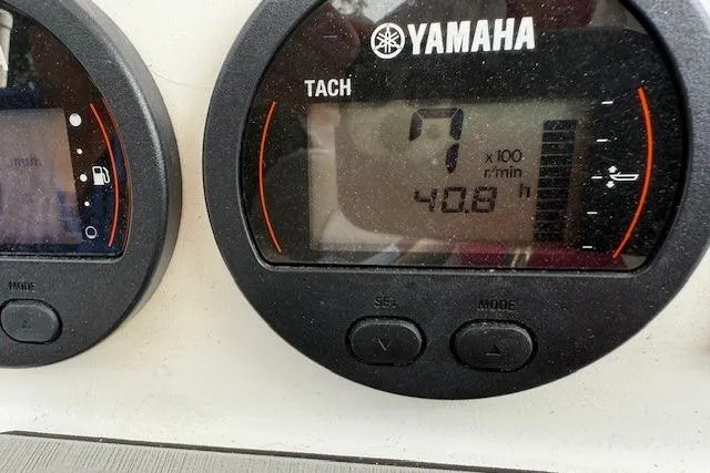 Slide: The Image of 2024 Sea Fox 228 Commander boat interior with cushioned seating and modern design. - 8