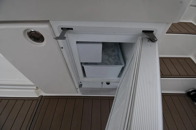 Slide: The Image of Ice maker on 2000 Silverton 392 Motor Yacht with open door and visible ice. - 25