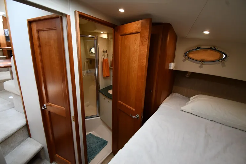 Slide: The Image of Interior of 2000 Silverton 392 Motor Yacht with bedroom and bathroom. - 33