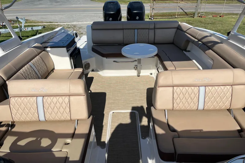 Slide: The Image of 2017 Sea Ray SDX 290 Outboard with luxurious seating and elegant interior design. - 2