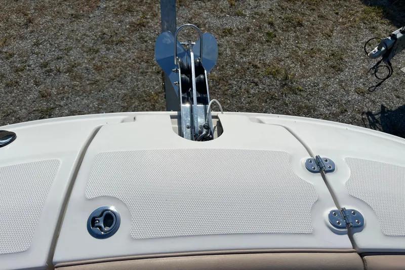Slide: The Image of 2017 Sea Ray SDX 290 Outboard boat deck with anchor and storage compartments. - 20