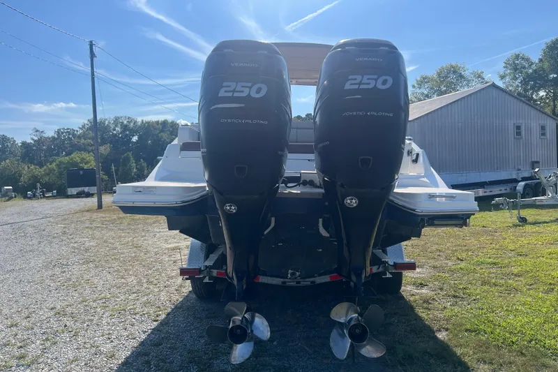 Slide: The Image of 2017 Sea Ray SDX 290 Outboard with dual 250 engines, parked outdoors. - 26