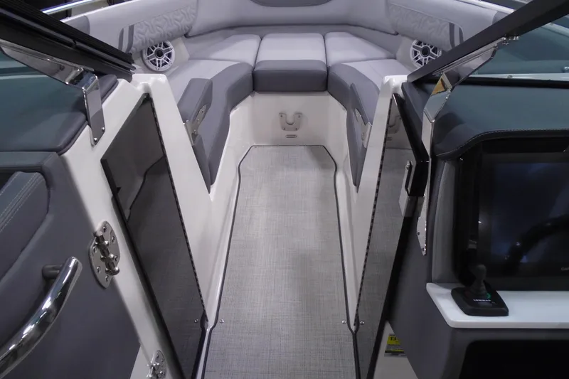 Slide: The Image of 2026 Regal LX4 boat interior with gray seating and modern design. - 15