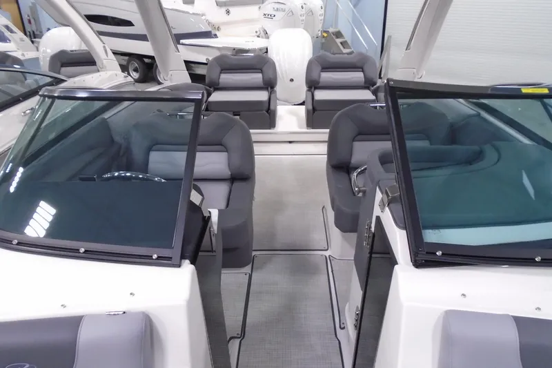 Slide: The Image of 2026 Regal LX4 boat interior with sleek seating and modern design. - 19