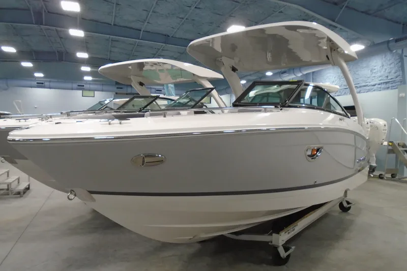 Slide: The Image of 2026 Regal LX4 boat in showroom, featuring sleek design and modern amenities. - 4