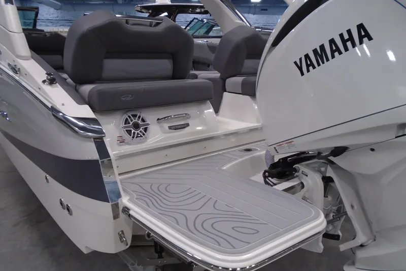 Slide: The Image of 2026 Regal LX4 boat with Yamaha engine, featuring sleek seating and modern design. - 6