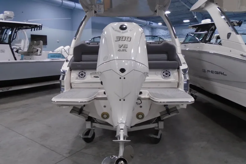 Slide: The Image of 2026 Regal LX4 boat with powerful 300 V6 engine in showroom. - 7