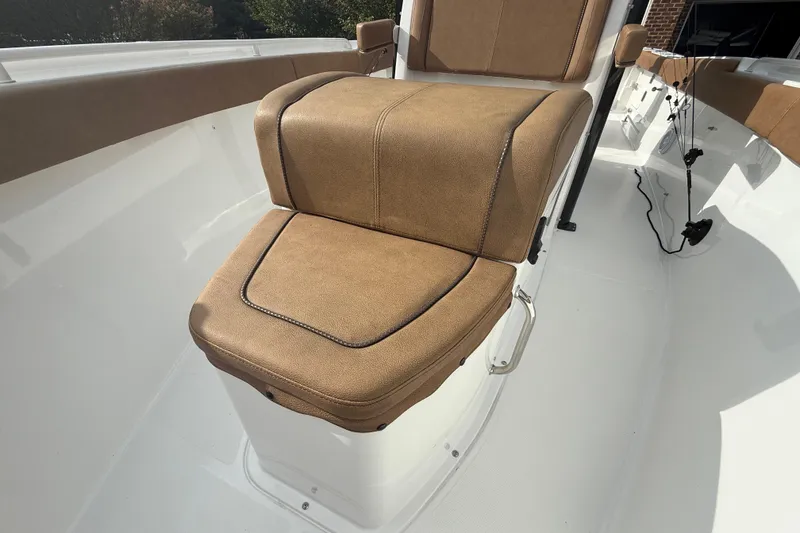 Slide: The Image of 2021 Sea Hunt Gamefish 27 Coffin Box with tan cushioned seating detail. - 14