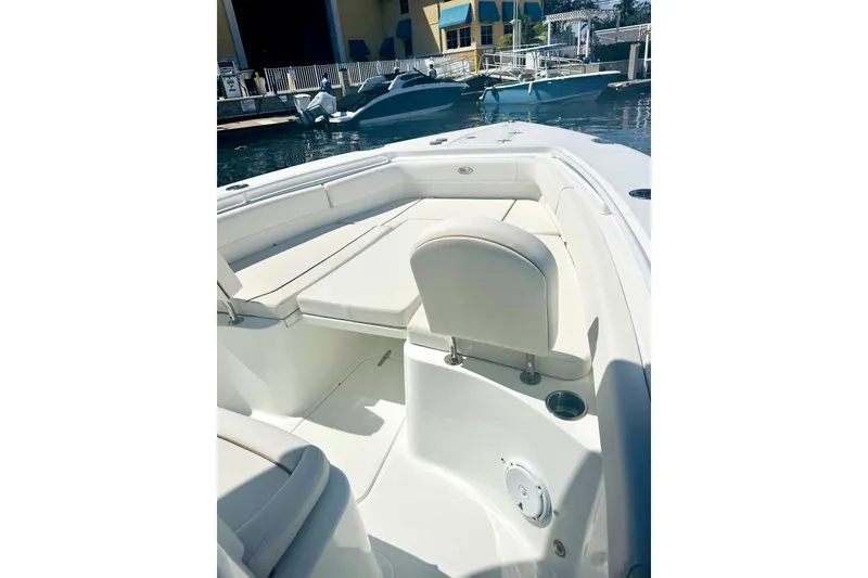 Slide: The Image of 2020 Sea Hunt Gamefish 27 Forward Seating boat interior at marina. - 6
