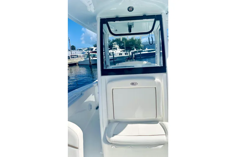 Slide: The Image of 2020 Sea Hunt Gamefish 27 Forward Seating boat interior at marina. - 9