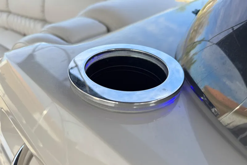 Slide: The Image of Cup holder on 2015 Bennington 2575 QCW boat, featuring sleek chrome finish. - 34