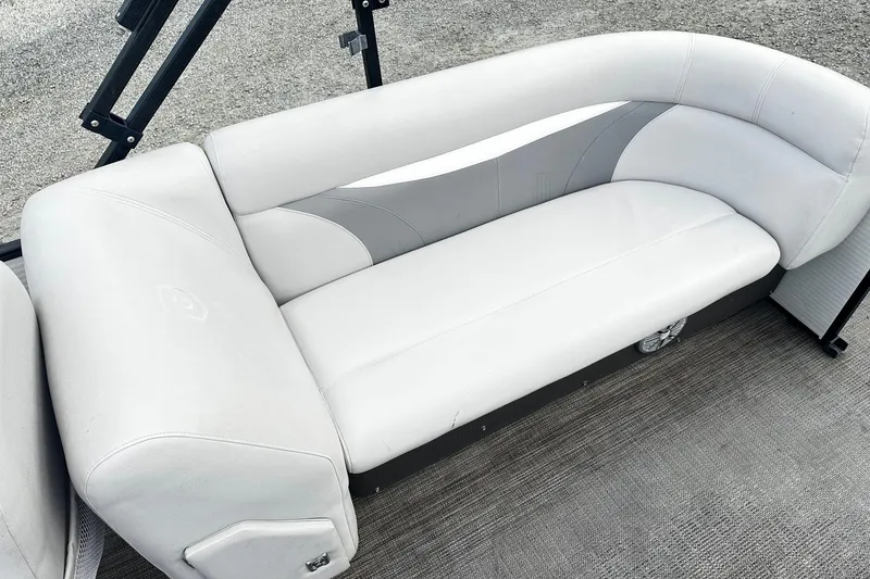 Slide: The Image of 2017 Godfrey Sweetwater 2286 Tri Toon boat seating, white and gray upholstery. - 11