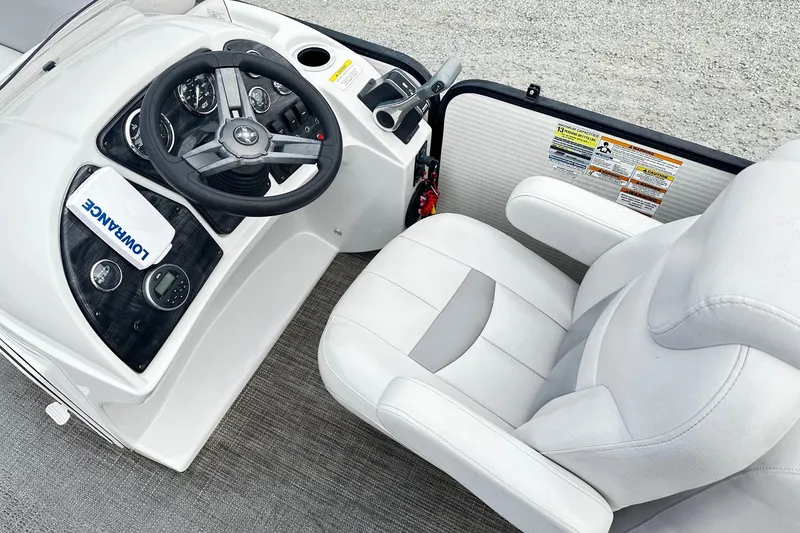 Slide: The Image of Captain's seat and helm of 2017 Godfrey Sweetwater 2286 Tri Toon boat. - 4