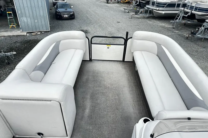 Slide: The Image of 2017 Godfrey Sweetwater 2286 Tri Toon interior with spacious seating and modern design. - 6