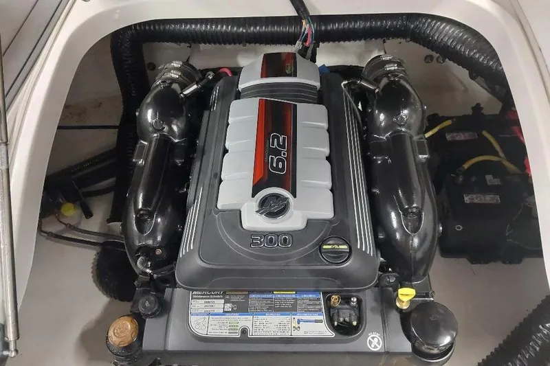 Slide: The Image of 2021 Chaparral 267 SSX engine compartment with 6.2L Mercury engine. - 12