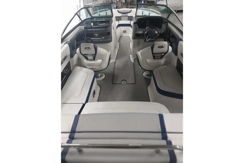 Slide: The Image of Interior of 2021 Chaparral 267 SSX boat with modern seating and dashboard. - 6