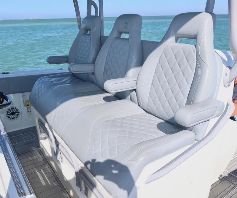 Slide: The Image of Luxury seating on a 2020 SeaVee 370z boat with quilted upholstery. - 20