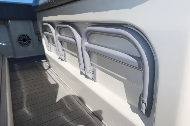 Slide: The Image of 2020 SeaVee 370z boat with mounted rod holders on deck. - 24
