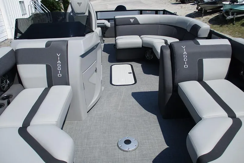 Slide: The Image of 2025 Viaggio Lago X20R pontoon boat interior with modern seating and sleek design. - 10