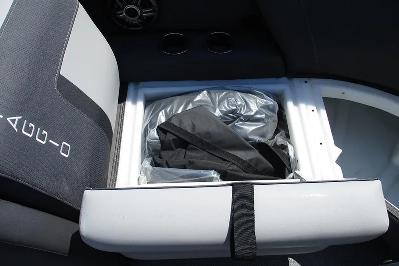 Slide: The Image of Viaggio Lago X20R 2025 boat seat storage compartment with black and gray upholstery. - 14
